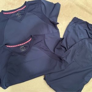 2 sets, including jackets, XL Heart and Soul scrubs.